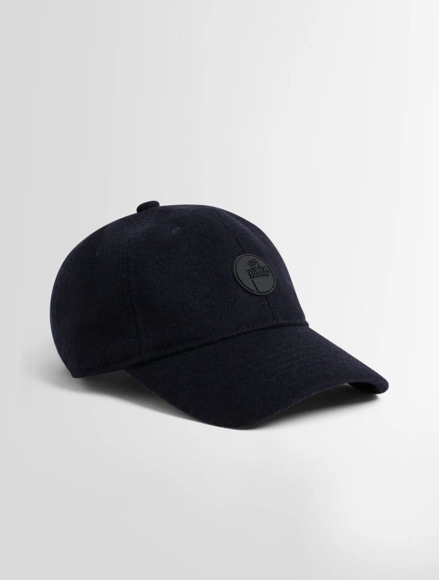 Casquette en laine bleu marine à écusson