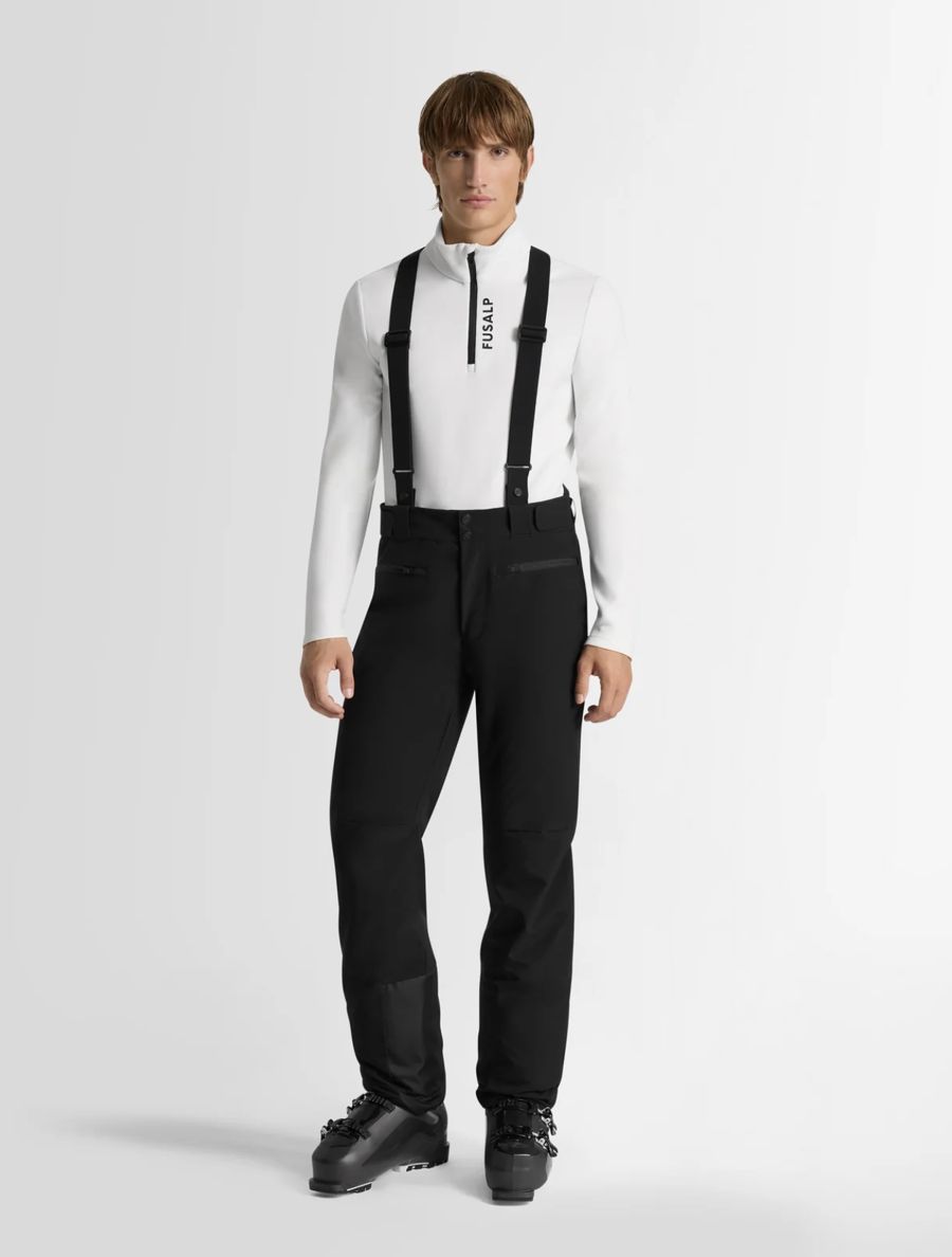 Pantalon de ski noir à bretelles et sous-pull blanc