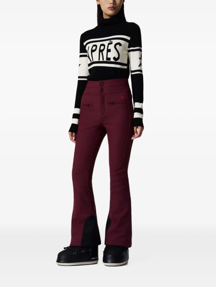 Pantalon de ski évasé bordeaux et pull noir et blanc « Après »